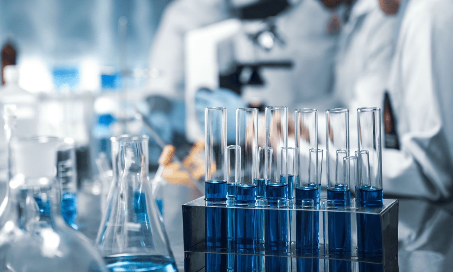 Recent updates to R&D claims- image of test tubes in a lab